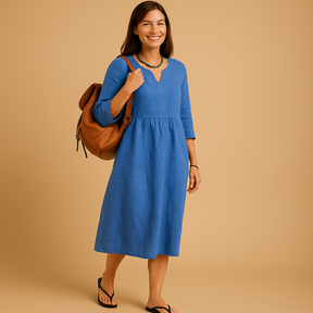 Hoog getailleerde dames midi-jurk met V-hals en halflange mouwen, geschikt voor formele en casual gelegenheden.