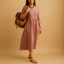 Hoog getailleerde dames midi-jurk met V-hals en halflange mouwen, geschikt voor formele en casual gelegenheden.
