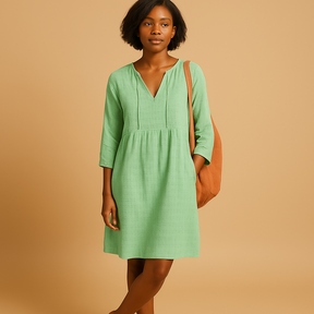 Zomerse midi-jurk voor dames met korte mouwen in wit, groen of lichtblauw, ideaal voor casual of formele gelegenheden.