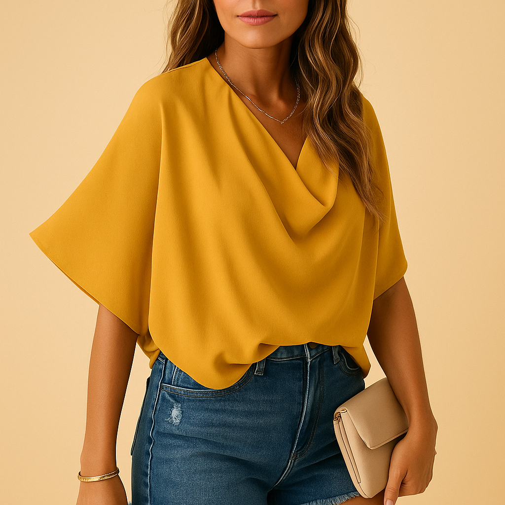 Luchtige dames blouse van chiffon met vleermuismouwen en V-hals in zachte kleuren, ideaal voor dagelijks gebruik of een avondje uit