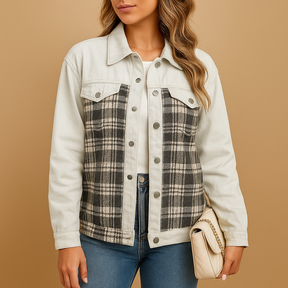 Comfortabele damesjas van ademend textiel met ruime pasvorm en zijzakken, ideaal voor casual en geklede outfits.