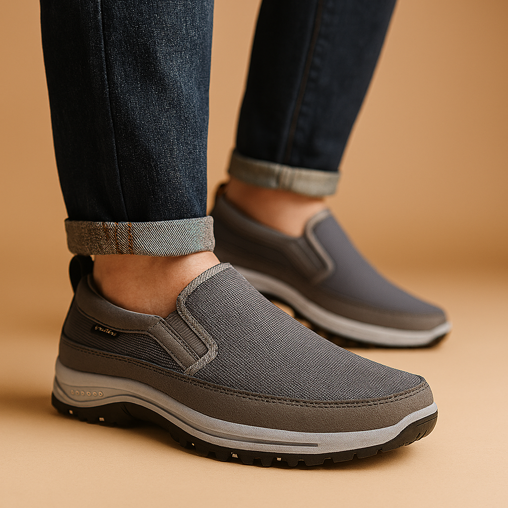 Comfortabele instappers voor heren met ademend bovenwerk, rubberen zool en lichtgewicht design – ideaal voor wandelen, reizen of dagelijks gebruik.