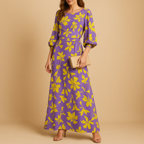 Dames zomerjurk met opvallend ontwerp en elegante pasvorm, perfect voor brunches, tuinfeesten en zomerse avonden.
