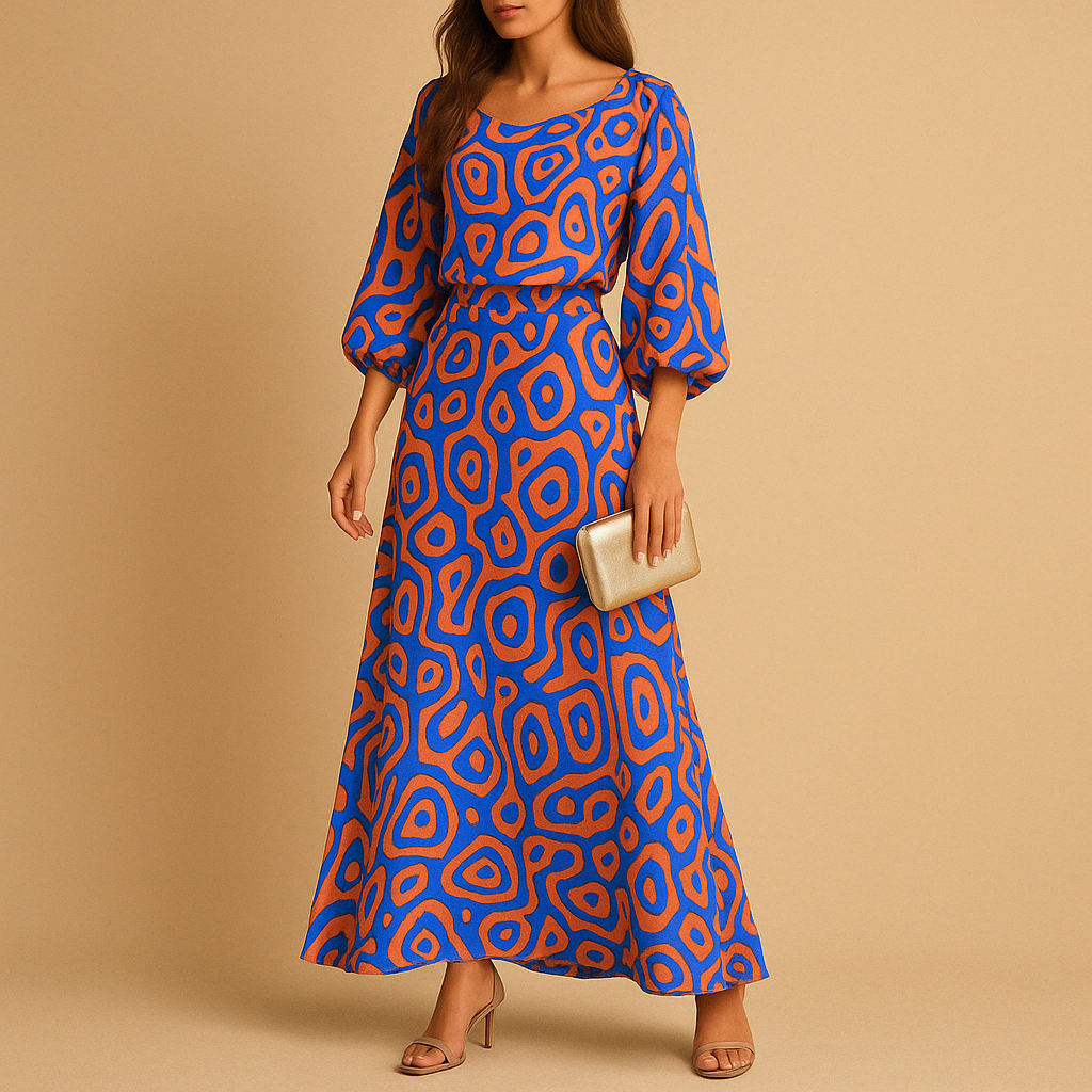 Dames zomerjurk met opvallend ontwerp en elegante pasvorm, perfect voor brunches, tuinfeesten en zomerse avonden.