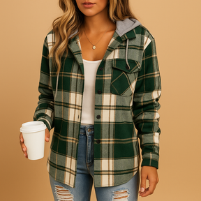 Damesjas met groene ruit en gevoerde capuchon, perfect voor frisse herfst- en winterdagen.