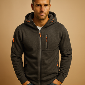 Heren hoodie met rits en capuchon, verkrijgbaar in meerdere kleuren. Comfortabel en veelzijdig voor casual en sportieve outfits in de herfst en winter.