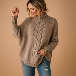 Lange chunky gebreide damestrui in winterstijl, ideaal voor casual en warme winterlooks.