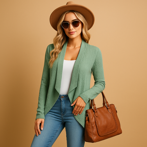 Lange gebreide cardigan voor dames in zachte stof en effen kleuren, ideaal voor layering in lente en herfst met een elegante en casual look.