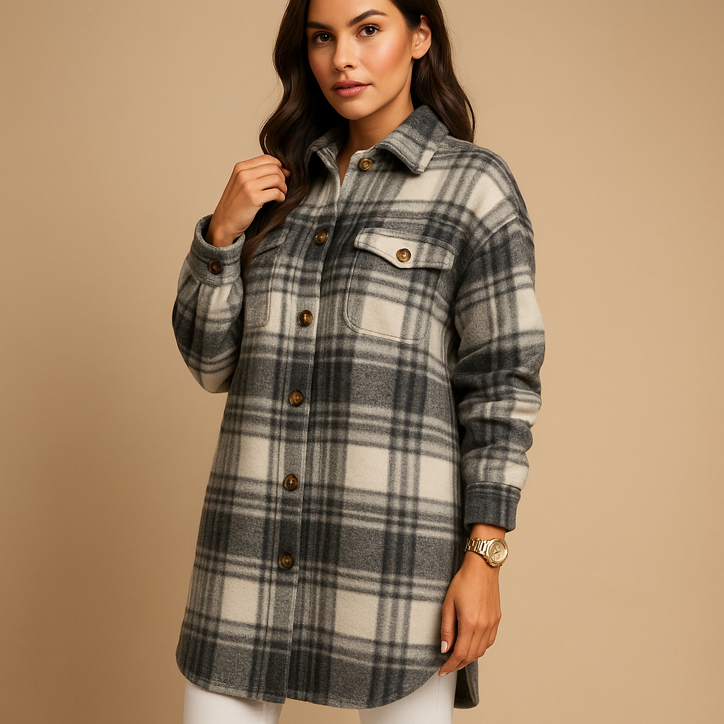 Lange geruite jas voor dames in wol-look met getailleerde pasvorm, zachte binnenkant en klassieke uitstraling. Perfect voor dagelijks en formeel gebruik.
