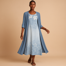 Lange damesjurk met blousejasje, flatterende pasvorm en elegante stijl. Ideaal voor formele gelegenheden, werk en feestelijke events.