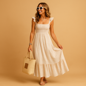 Lange dames zomerjurk zonder mouwen met vloeiende pasvorm, perfect voor warme dagen, feestjes of casual momenten.