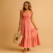 Lange dames zomerjurk zonder mouwen met vloeiende pasvorm, perfect voor warme dagen, feestjes of casual momenten.