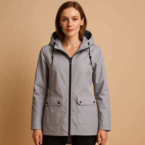 Lange waterafstotende regenjas met capuchon voor dames, ademend materiaal, ideaal voor dagelijks gebruik in weer en wind.