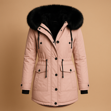Lange waterdichte winterjas voor dames met luxe bontkraag, warme voering en verlengd silhouet. Perfect voor koude en natte winterdagen.