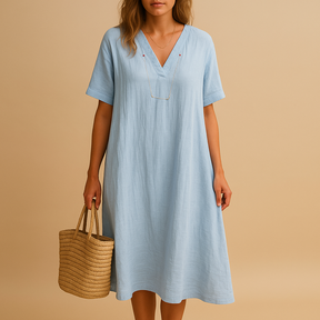 Lichte en ademende zomerjurk voor dames in losse pasvorm. Perfect voor warme dagen en geschikt voor zowel casual als feestelijke gelegenheden.