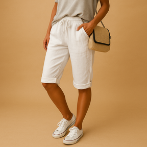 Dames capribroek met elastische taille en strikkoord, relaxed fit en opgerolde zoom, ideaal voor lente- en zomerdagen.