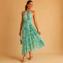 Dames maxi-jurk met bloemenprint, mouwloos design en hoge taille, ideaal voor zomerse dagen, feestjes en vakanties.