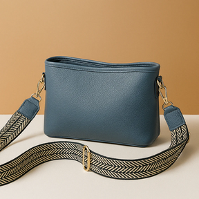 Sling bag voor dames met modern ontwerp, verstelbare riem en ruim hoofdvak, perfect voor werk, school of dagelijks gebruik.