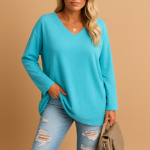 Zomerse dames top met losse pasvorm en zachte stof, ideaal voor casual en chique outfits in warme seizoenen.