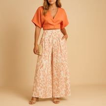 Dames tweedelige set met bloemenprint en wijde broek, luchtige outfit voor stranddagen of zomerse momenten