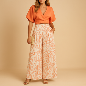 Dames tweedelige set met bloemenprint en wijde broek, luchtige outfit voor stranddagen of zomerse momenten